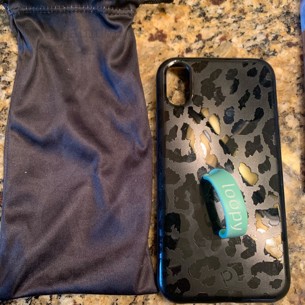 Loopy Case for IPhone XR. Also has black loopy strap that was never used.